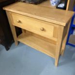 A Solid light oak contemporary one drawer console table, Measures 75x90x31cm