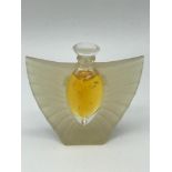 A Vintage Miniature Lalique perfume bottle designed with single nude lady figure and frosted style