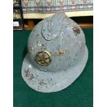 A WW1 French Helmet retrieved from the Somme Battle Area.