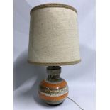 A Retro West German table lamp, detailing brown and orange porcelain base. With original canvas