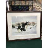 A Limited edition print 240/600 after Steven Townsend, depicting two border collies in the snow.