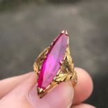 A Beautiful 22ct gold ladies ring set with a possible Large Ruby or Pink Sapphire. Stamped with a