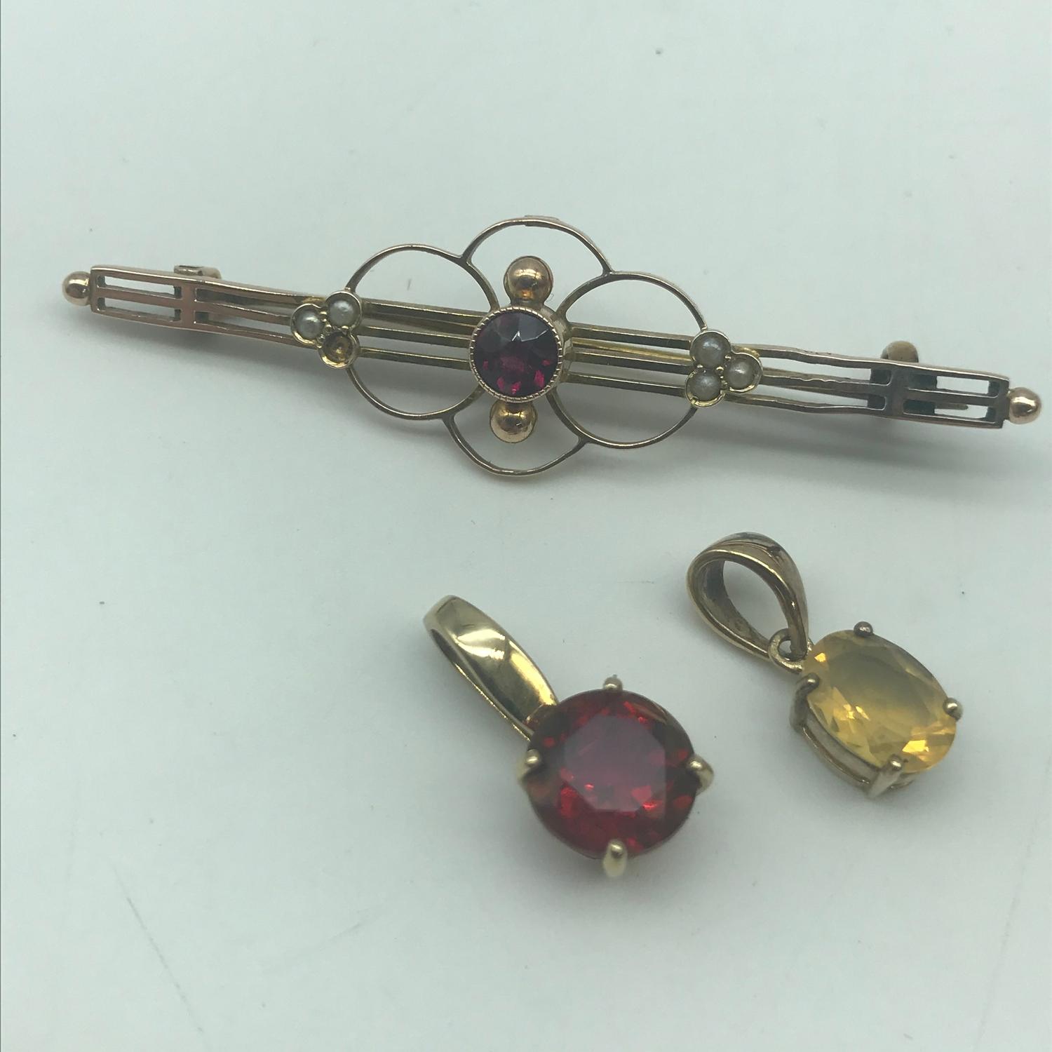 Art Nouveau 9ct gold ladies brooch set with seed pearls and pink ruby style stone. Together with two