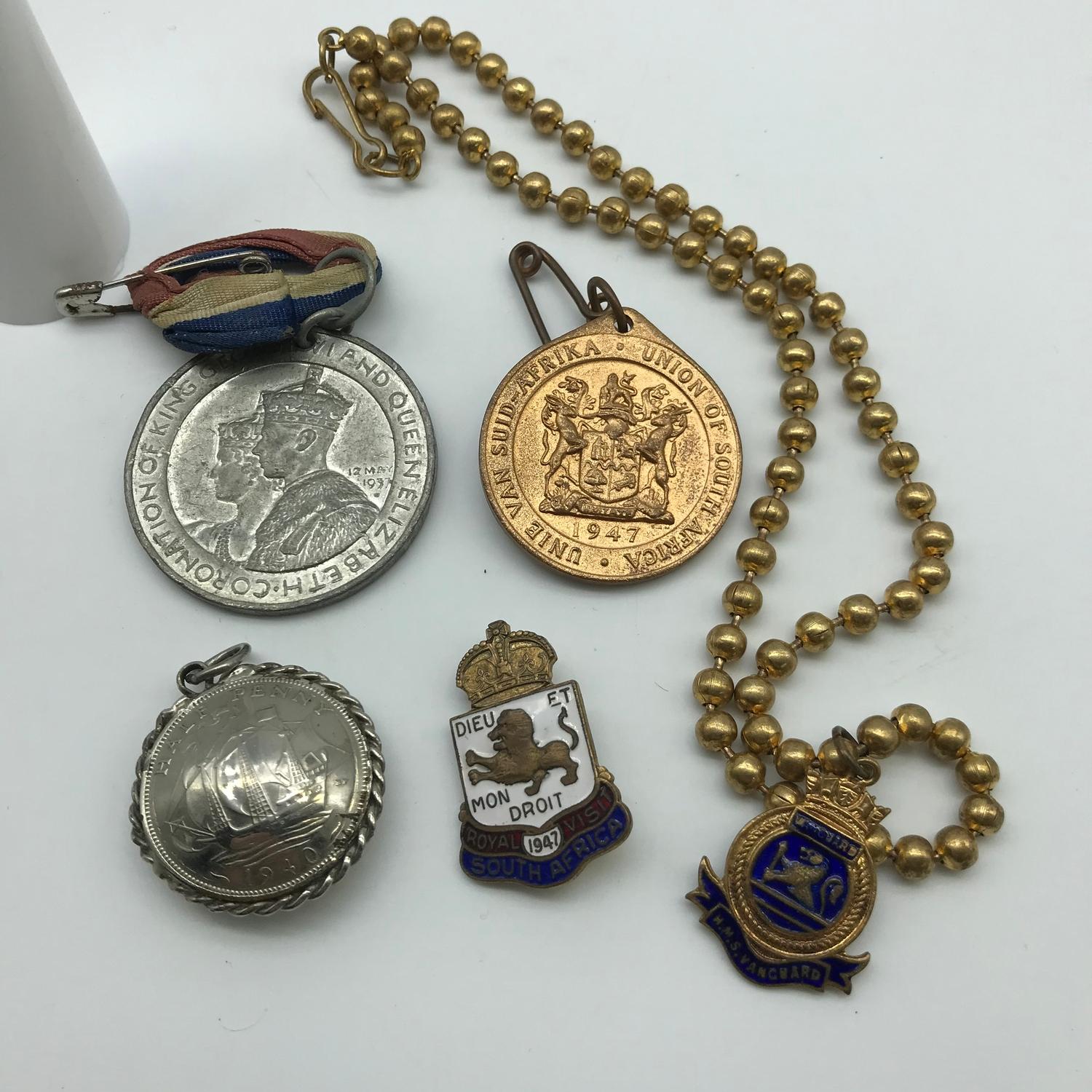 A Lot of two commemorative medals, 1940 silver coin pendant, Royal Visit South Africa 1947 badge and