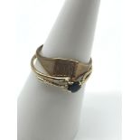 A 9ct gold ladies ring set with a single sapphire and a 9ct gold signet ring, Total weight 1.74grams