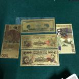 A Lot of 5 Gold foil bank notes.