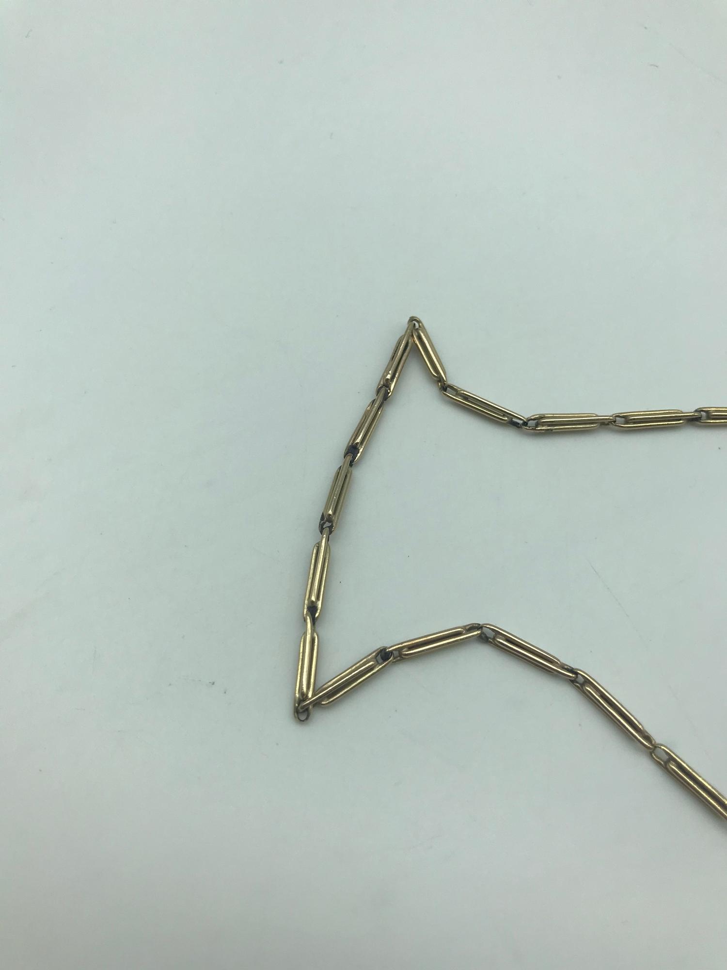 A 9ct gold Necklace possibly an Albert Chain. Measures 22inches. Weighs 12.77grams - Image 4 of 4