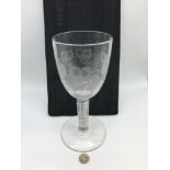 A Large Early Georgian glass rummer, etched with vines and grapes, finished with a twist stem