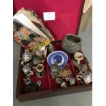 A Mahogany antique box containing a collection of odds . Which includes German steins, Scrap