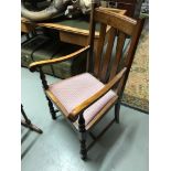 A Late Victorian arm chair made from oak.