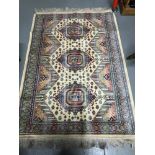 A Highly detailed persian style silk rug. Measures 142x99cm