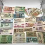 A Large collection of far & Middle eastern bank notes