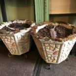 A pair of vintage heavy garden octagonal planters with cast iron feet. Measure 36x40x40cm