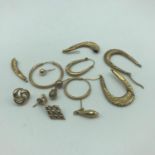 A Selection of scrap gold earrings. Weighs 5.71grams