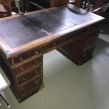 A Victorian knee hole desk, needs attention.