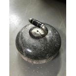 Antique curling stone with handle marked E.H.E.