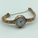 Antique 9ct gold wrist watch, 9ct gold casing and bracelet. In a working condition. Total weight