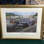 A Formula 1 racing car print titled "Triple Achievement" by Alan Fearnley signed by the artist and