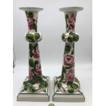 A Large pair of Wemyss Ware candle sticks depicting cabbage rose design, signed Wemyss ware Exon