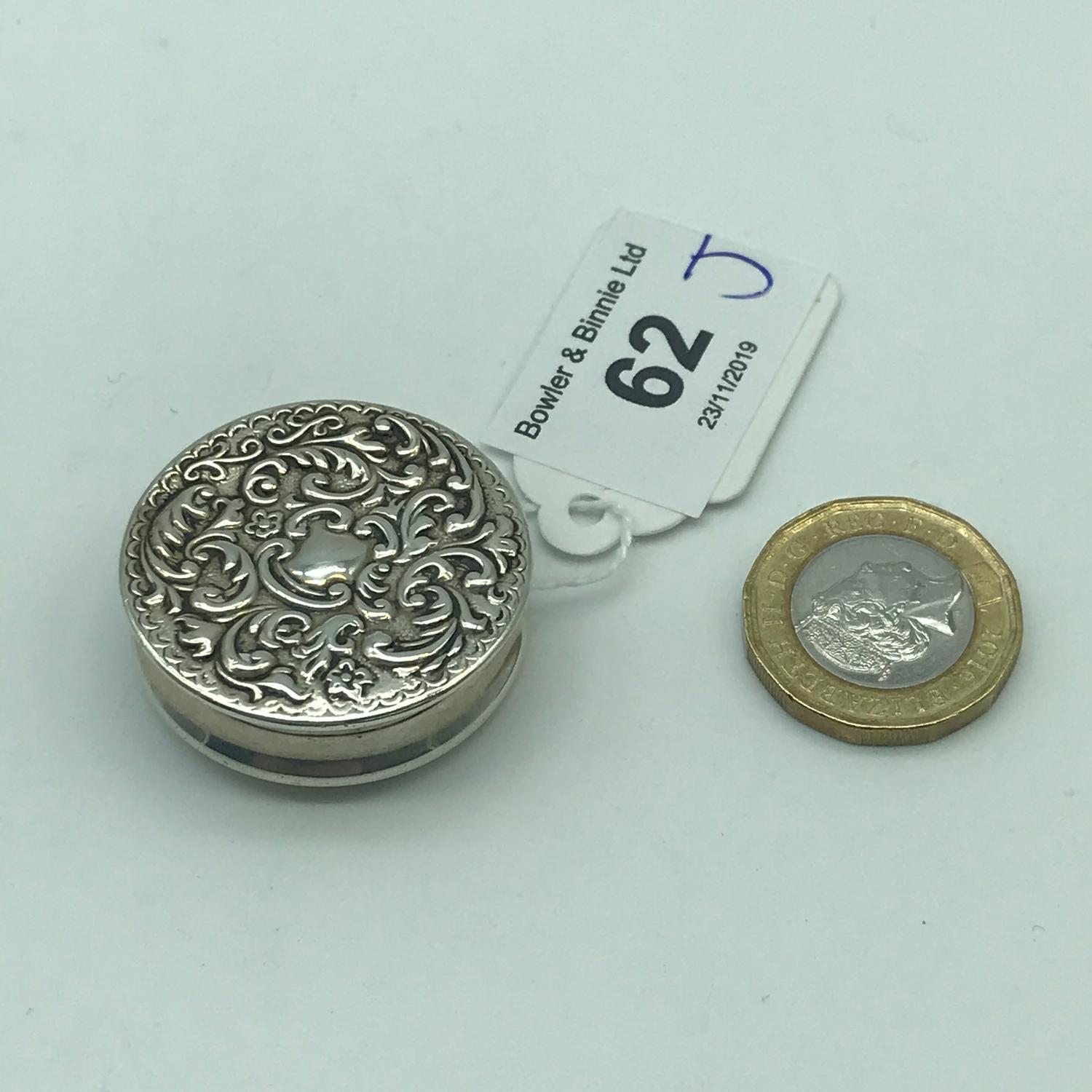 A Birmingham silver ornate pill box, Maker E.S. Barnsley & Co, dated 1898.