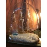 A Large early 1900's Nailsea spun glass sailing ship in a dome display. Displaying hand blown ship