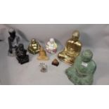 A Collection of religious icons and Cast Iron, Carved Stone and ceramic Buddhas.