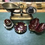 A Vintage kitchen weighing scales with weights together with 4 pieces of Carlton ware Rouge Royale.