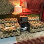 A Retro 1970's three seat and two singles psychedelic material suite. Very stylish and comfortable.