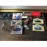 A Lot of vintage boxed car and bus models includes Mickey mouse car figure