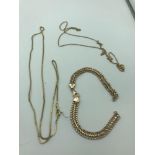 A 9ct gold chain, 18ct gold chain and 9ct gold bracelet in need of attention. Total weight of 9ct