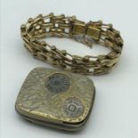 A Heavy Victorian gilt metal bracelet together with a Victorian ornate plated sovereign holder