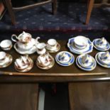 A Royal Albert old country roses tea set with tea pot, sugar and cream together with a diamond China