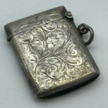 A Birmingham silver engraved vesta case. Maker William Henry Sparrow. Dated 1909.