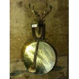A Vintage brass stag head with hanging gong and beater.