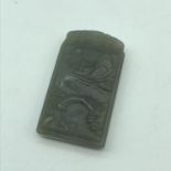A Finely carved Chinese hand carved jade pendant/ sculpture depicting a landscape/ fishing scene.