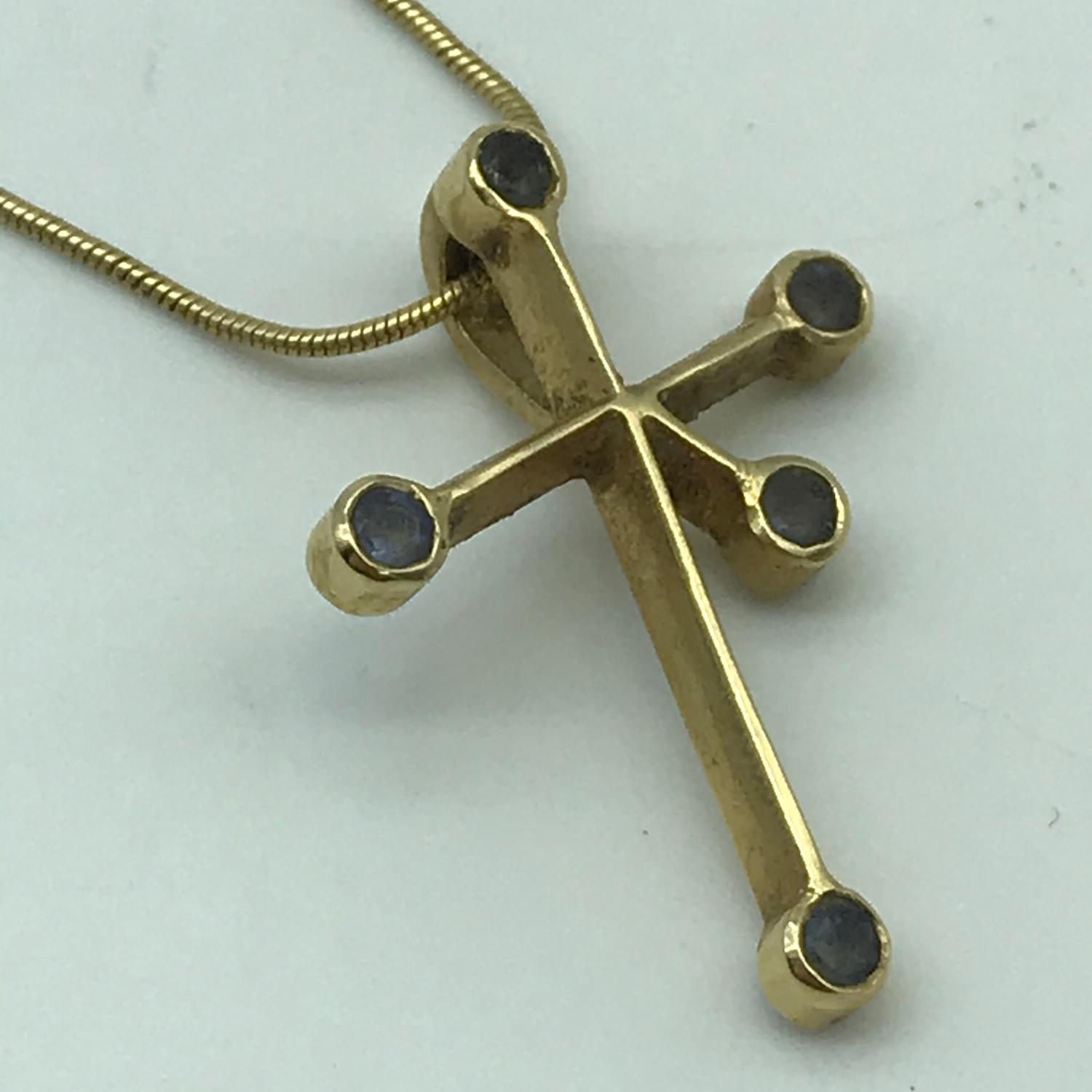 An 18ct gold necklace with an 18ct gold cross like pendant with clear stones. Weighs 5.45grams - Image 2 of 2