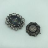 A Victorian unmarked engraved and raised relief brooch together with a heavy Sterling 925 Mexico