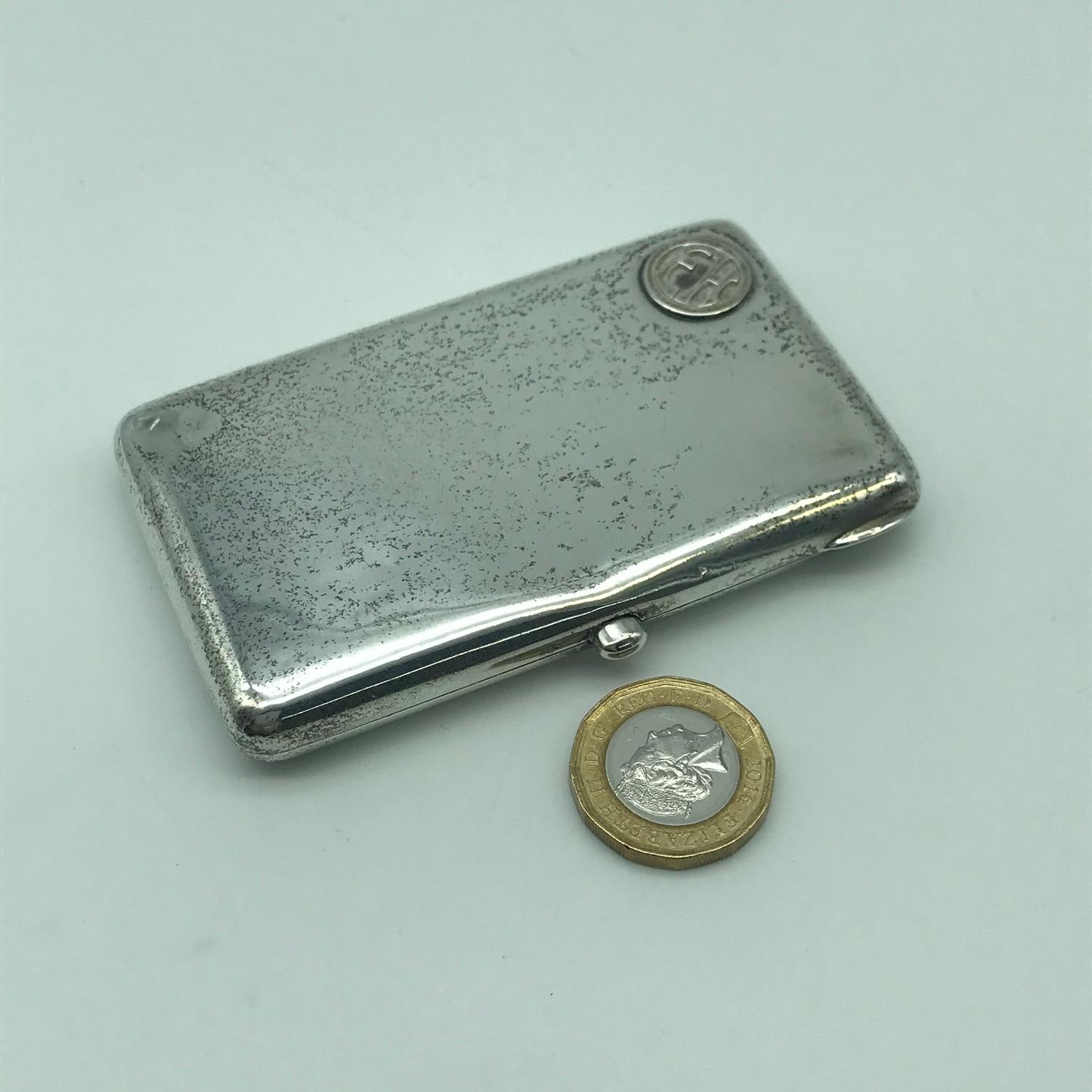 A 875 Silver cigarette case. Designed with raised initials E.H.