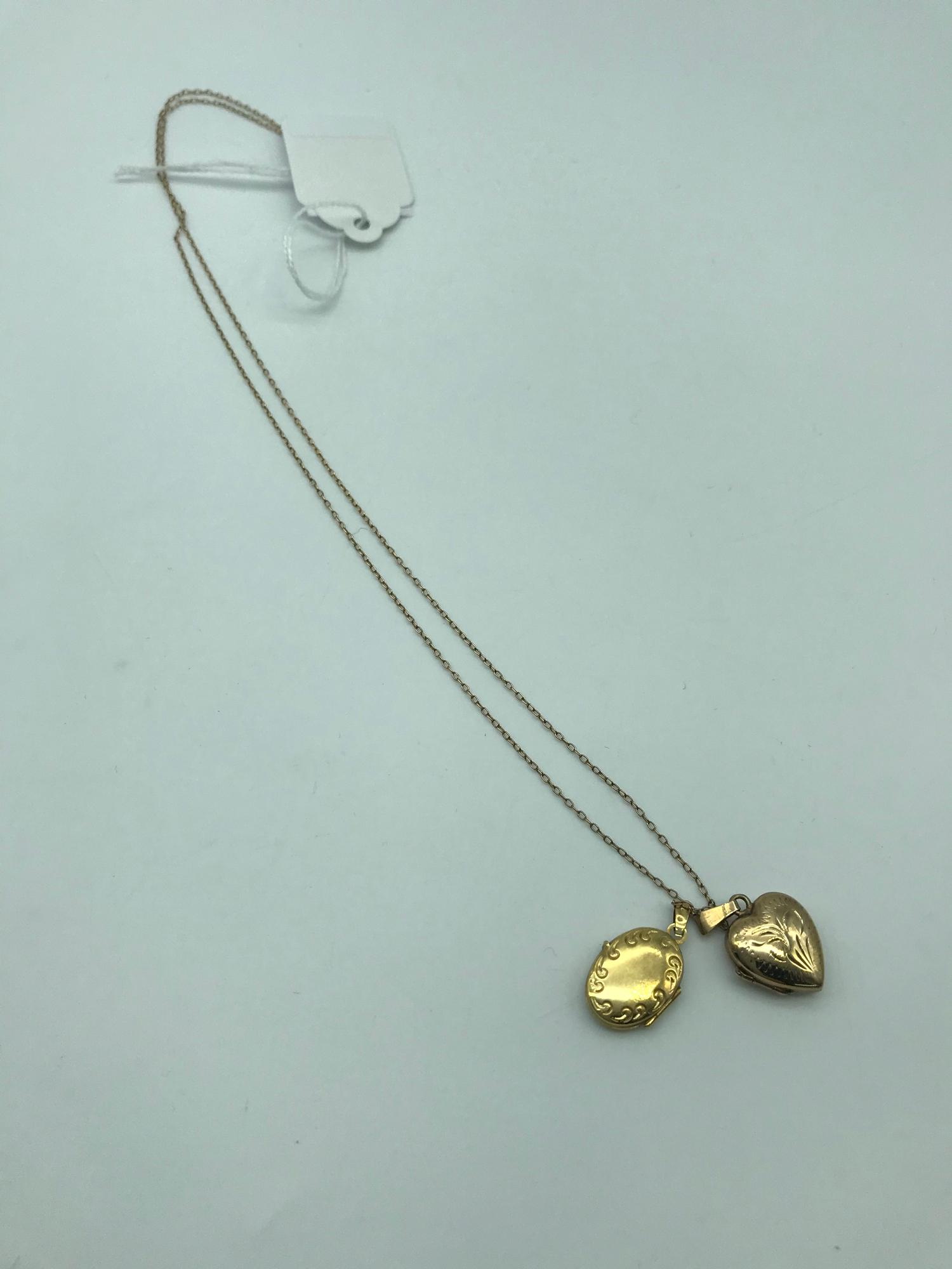 A 9ct gold chain together with two 9ct gold lockets. Total weight 3.91grams
