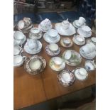 A Collection of Trios, cups and saucers, Sugar pot and cream jugs, Includes names such as Fenton,