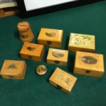 A Lot of 9 Mauchline trinket boxes, bank and pin cushion.