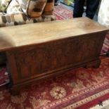 A Rustic antique solid oak linen chest. Finished with elements of a Gothic design