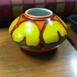 A Vintage Poole Pottery yellow, green and orange bulbous vase. Measures 11cm in height