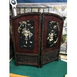 Antique Chinese small two fold screen, designed with raised relief mother of pearl and bone urns and