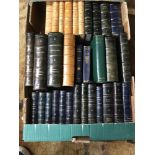 A Collection of various leather bound books which includes Charles Dickens, Kipling, Burns and