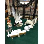 A selection of porcelain collectables which includes Large double seagull figurine and Donkey by