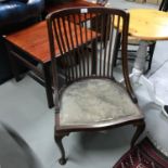 An Edwardian curved back ladies parlour chair