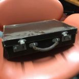 A Vintage ER briefcase.