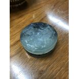 A Chinese jade trinket dish, Designed with carved top, Measures 6cm in diameter
