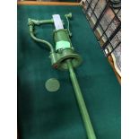 A vintage green painted water pump/ fuel pump.